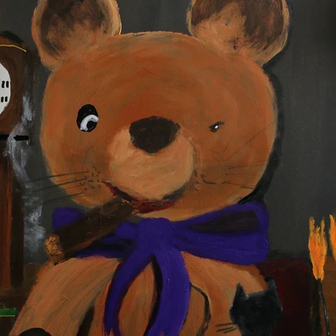 Detail: Bear with a purple scarf.