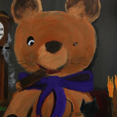 Detail: Bear with a purple scarf.